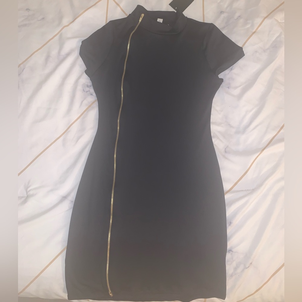 Black Mini dress with gold zipper. Size medium.